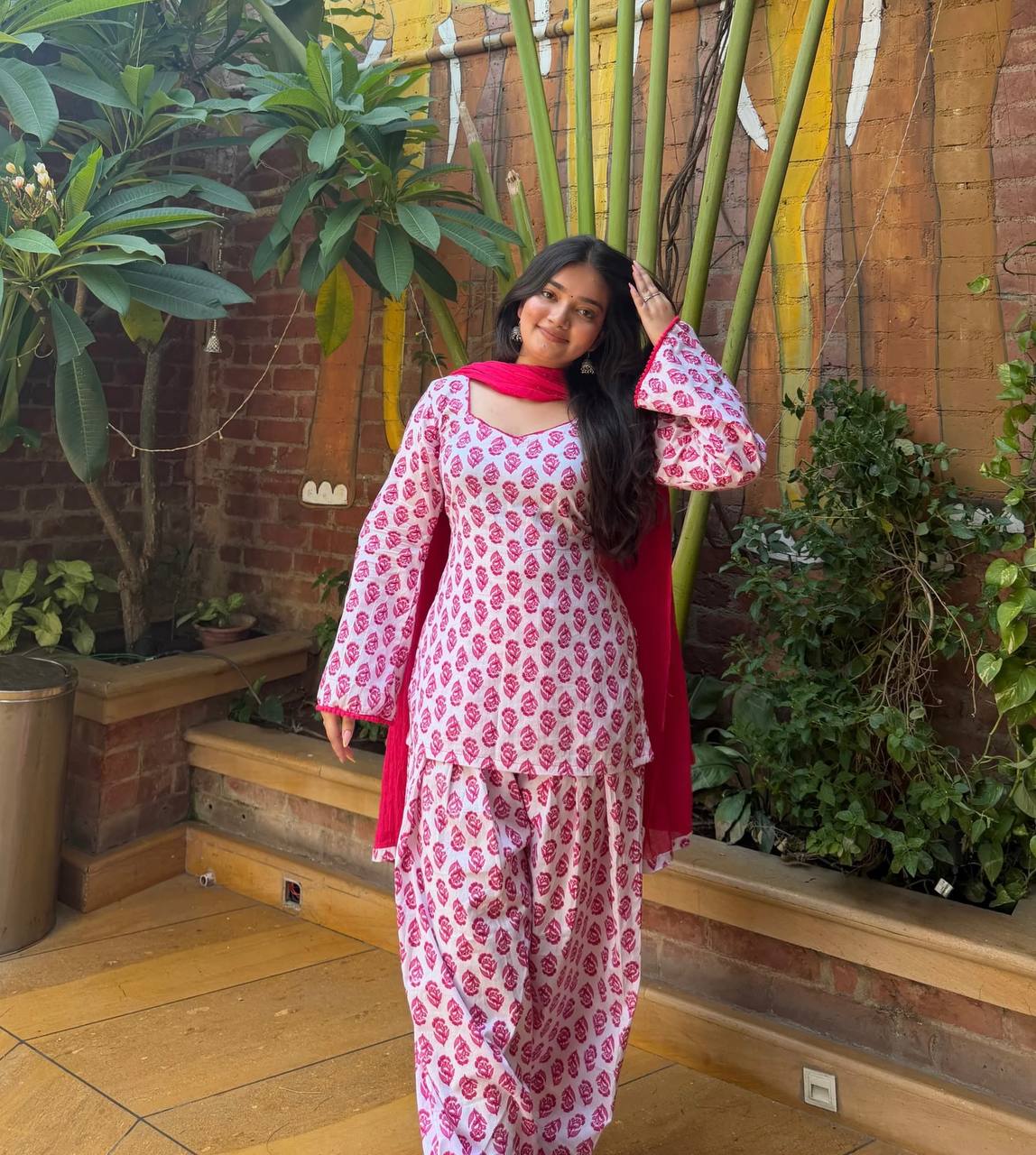Charming Pink Floral Block Print Peplum Kurti and Wide-Leg Palazzo Suit Set Featuring an Elegant Tie-Up Back and Solid Vibrant Dupatta
